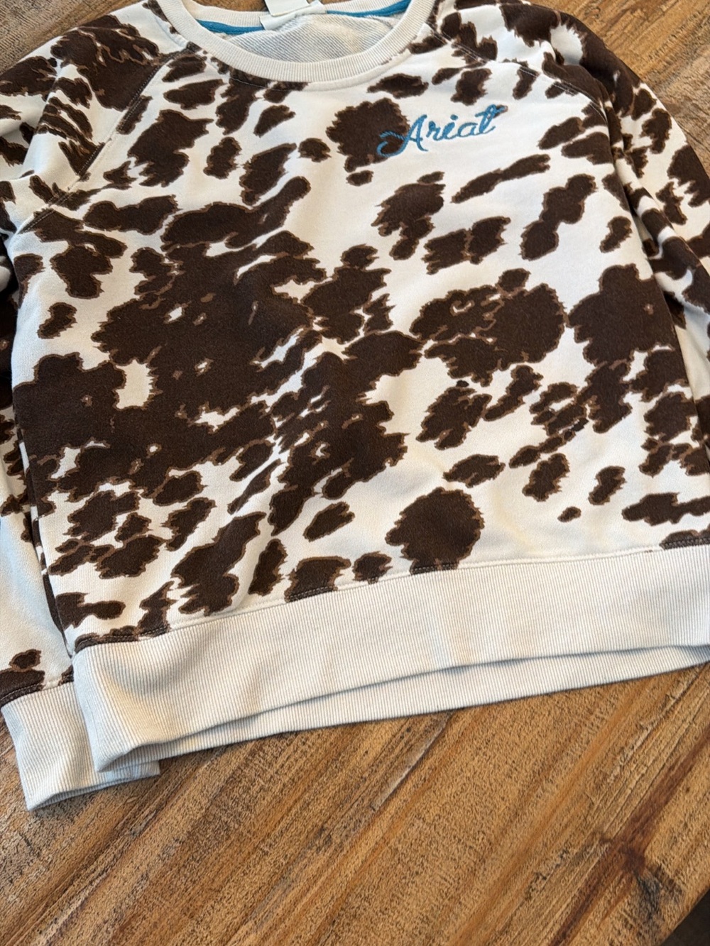 Ariat Women’s Brown and White Cow Pattern Crewneck